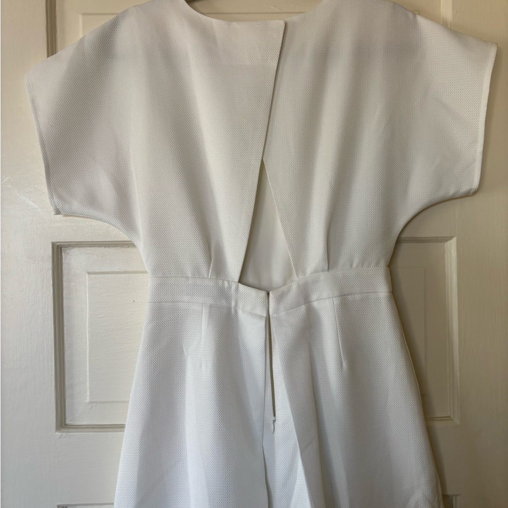White jumpsuit with Back Peephole